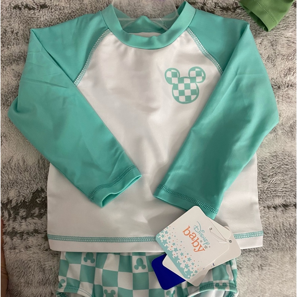 Disney Infant Toddler Swimsuit, 12M polyester spandex blend. Machine washable.
